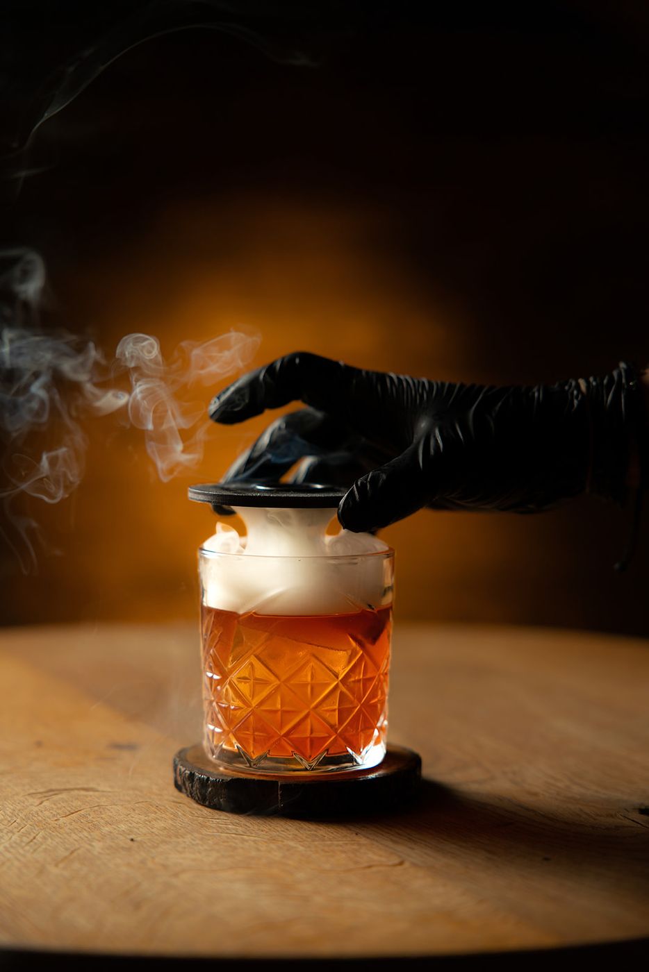 Smoked cocktail being served